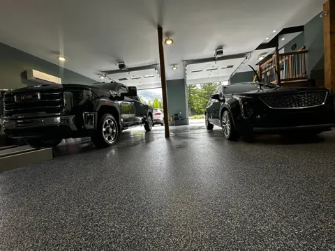 Two pickups detailed inside a heated garage