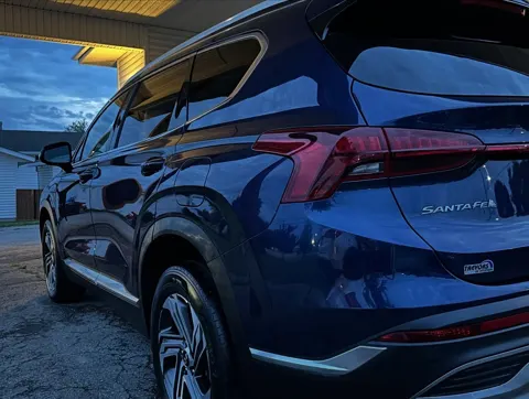 Blue Hyundai Santa Fe with a clean, glossy finish